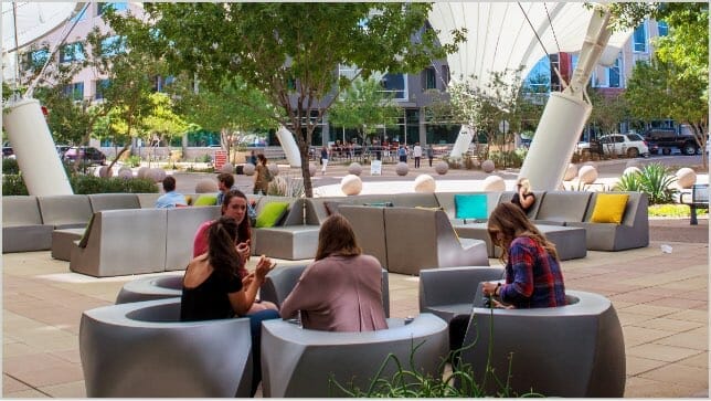 http://People%20utilizing%20outdoor%20seating%20area%20under%20structural%20canopy